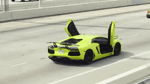 Green Lamborghini Aventador S Roadster doors open Miami mph club