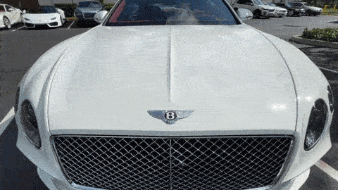 White on red Bentley GT rental Miami mph club