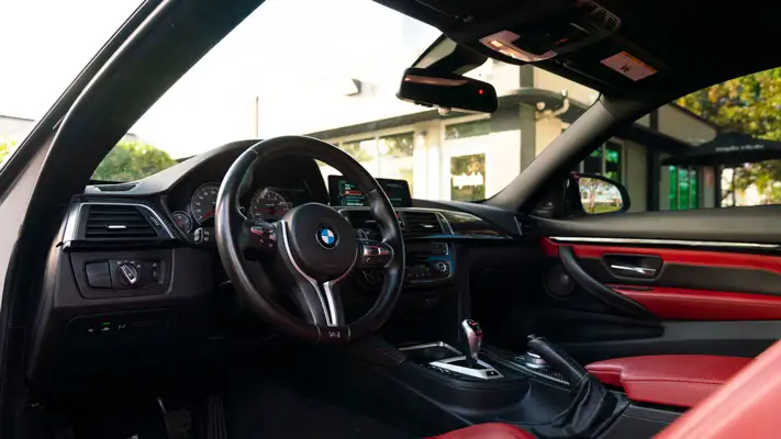 BMW M4 rental interior view mph club