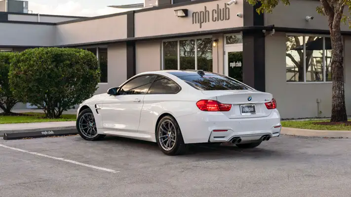 BMW M4 rental rear view mph club