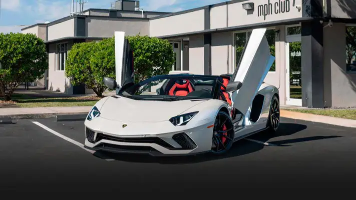 White Lamborghini Aventador S Roadster for rent Miami profile view - mph club