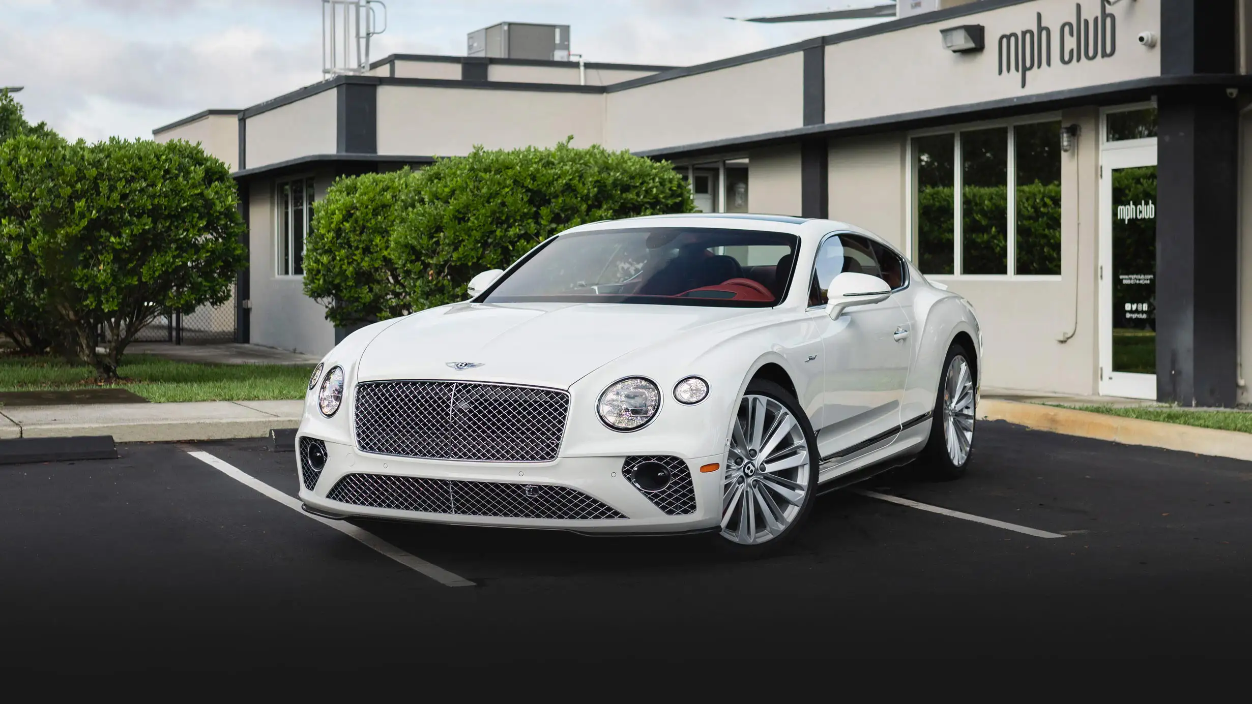White on red Bentley GT rental Miami profile view - mph club