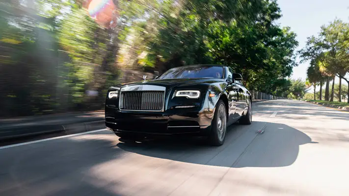 Black on black Rolls Royce Wraith rental Miami rolling view mph club