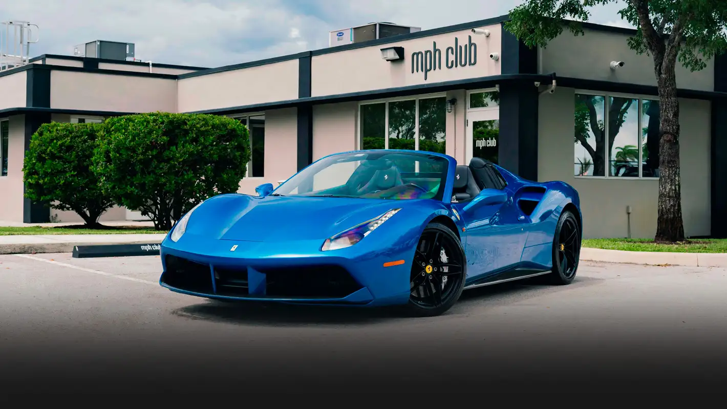 Blue Ferrari 488 Spider rental profile view mph club