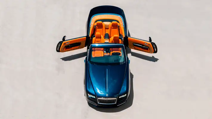 Blue Rolls Royce Dawn rental drone view mph club