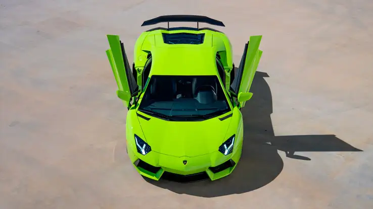 Green Lamborghini Aventador rental birds eye view mph club