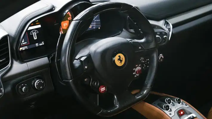 Grey Ferrari 458 Italia rental dashboard view mph club