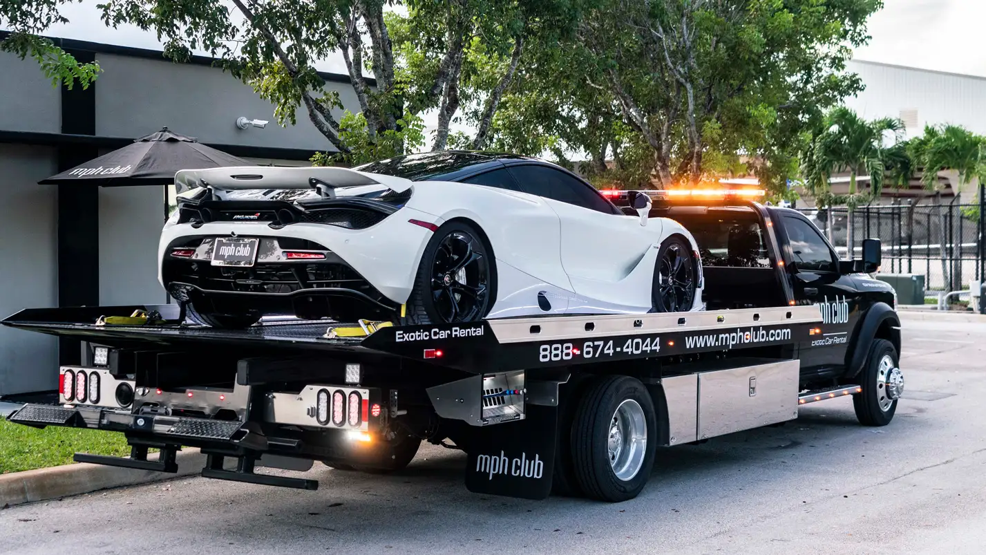 mclaren-720s-rental-loaded-on-mph-club-tow-truck-exotic-car-rentals-delivery-services