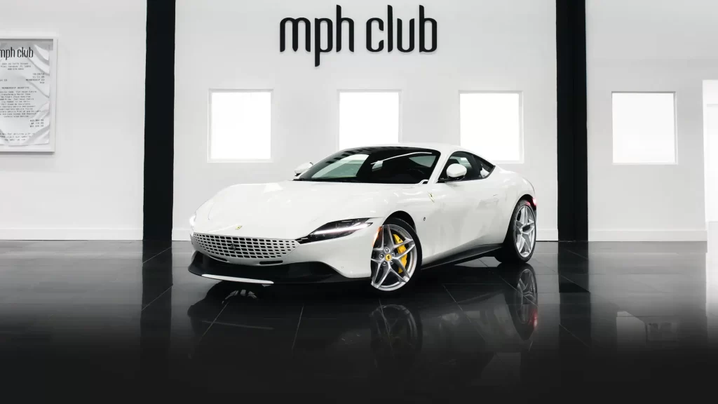White Ferrari Roma rental Miami profile view mph club