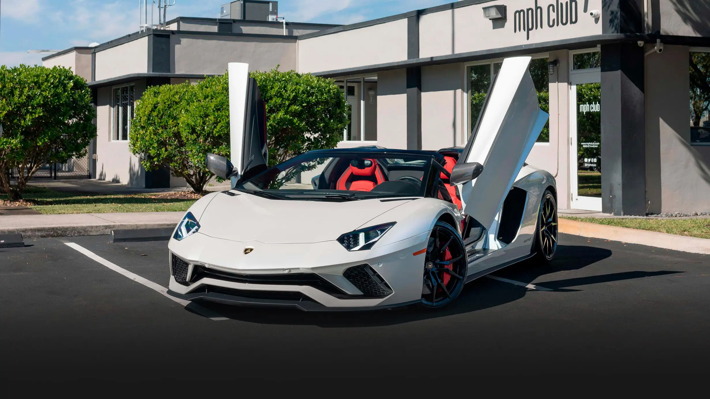 White Lamborghini Aventador S Roadster for rent Miami profile view mph club