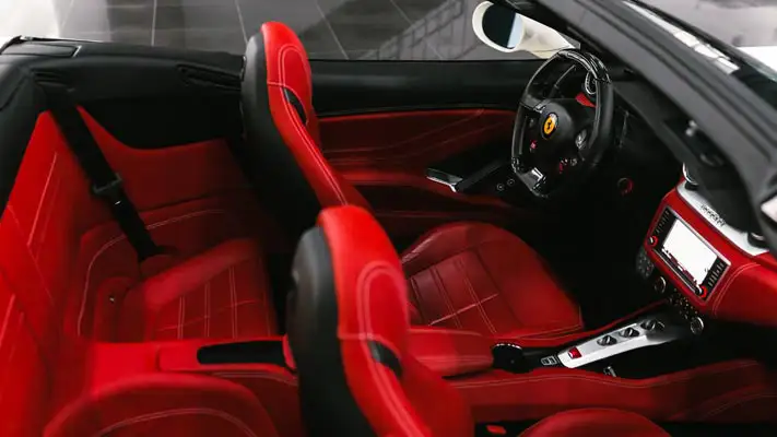 White on red Ferrari California T rental interior view mph club