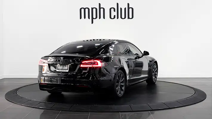 Black Tesla Model S Plaid rental rear view mph club