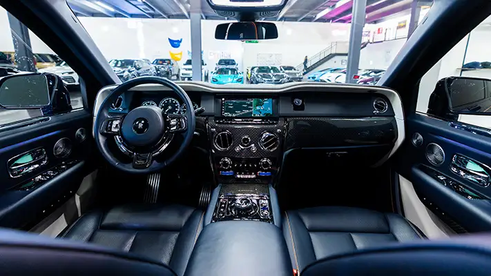 Blue Rolls Royce Cullinan Black Badge rental dashboard view mph club