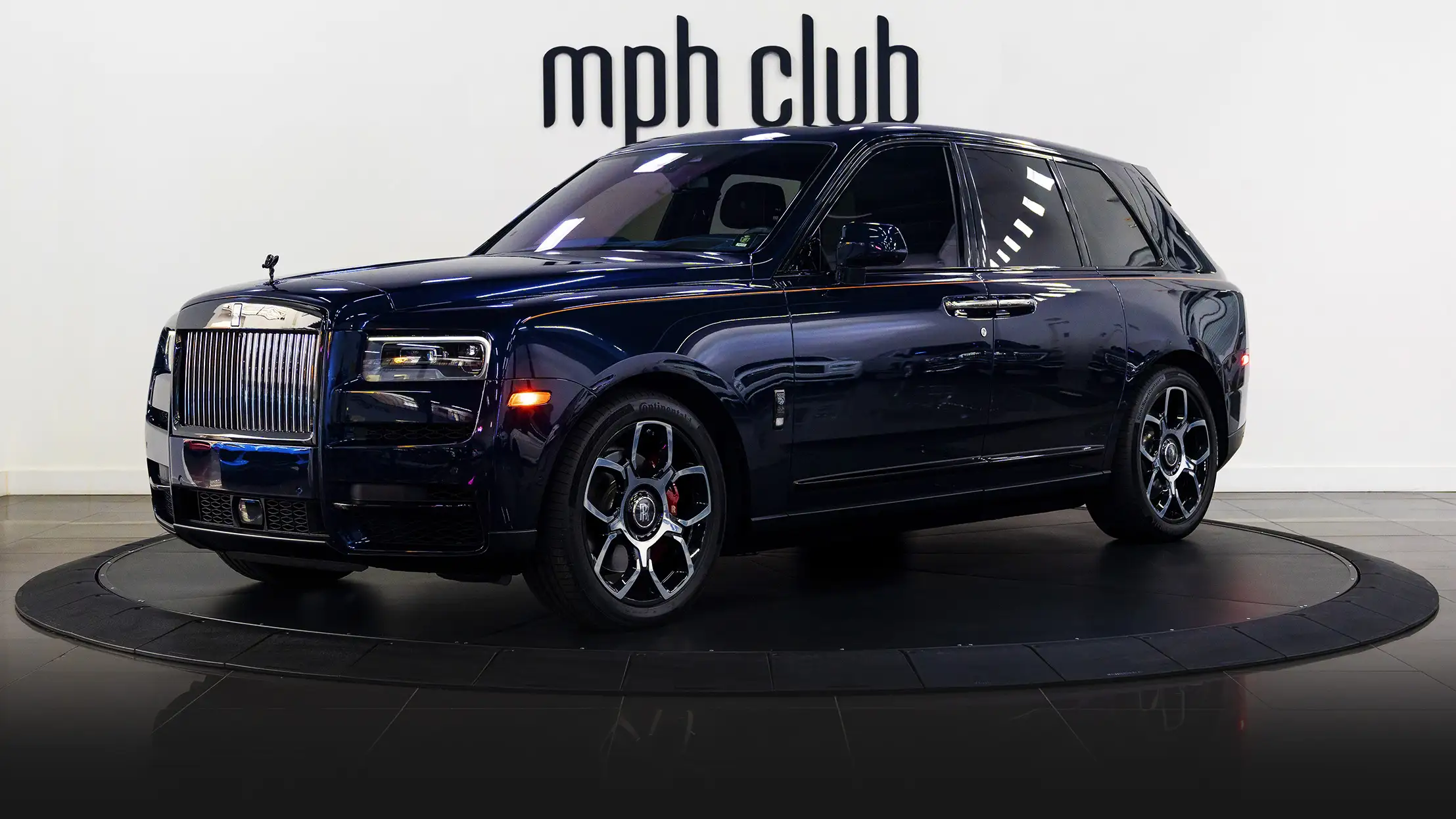 Blue Rolls Royce Cullinan Black Badge rental profile view mph club