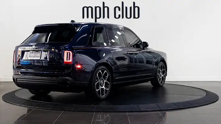Blue Rolls Royce Cullinan Black Badge rental rear view mph club