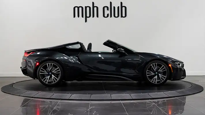 Grey on black BMW I8 rental side view mph club