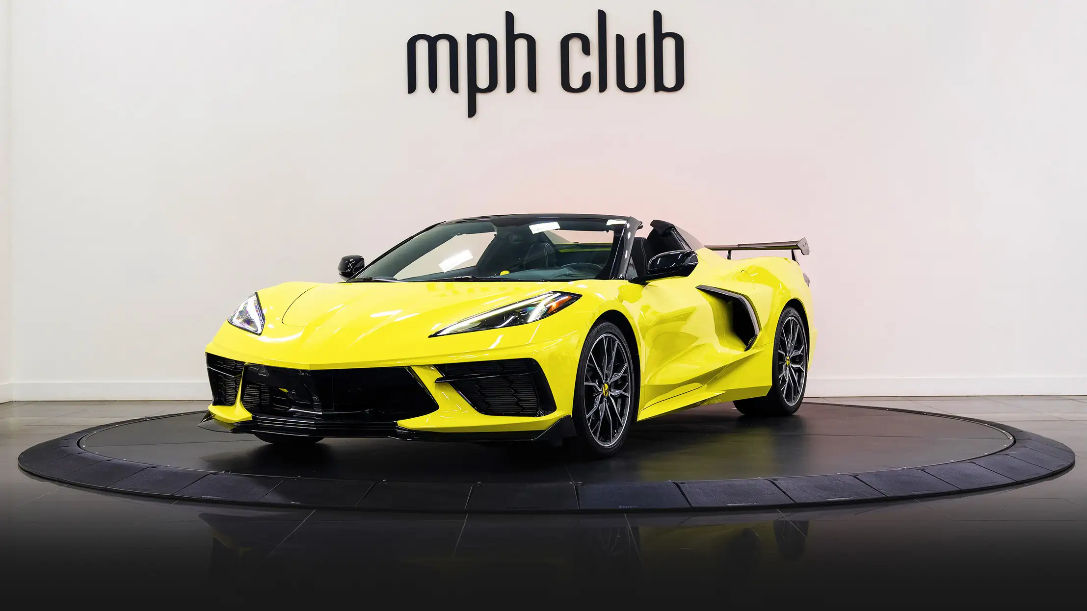 Yellow Chevrolet Corvette C8 3LT rental profile view mph club