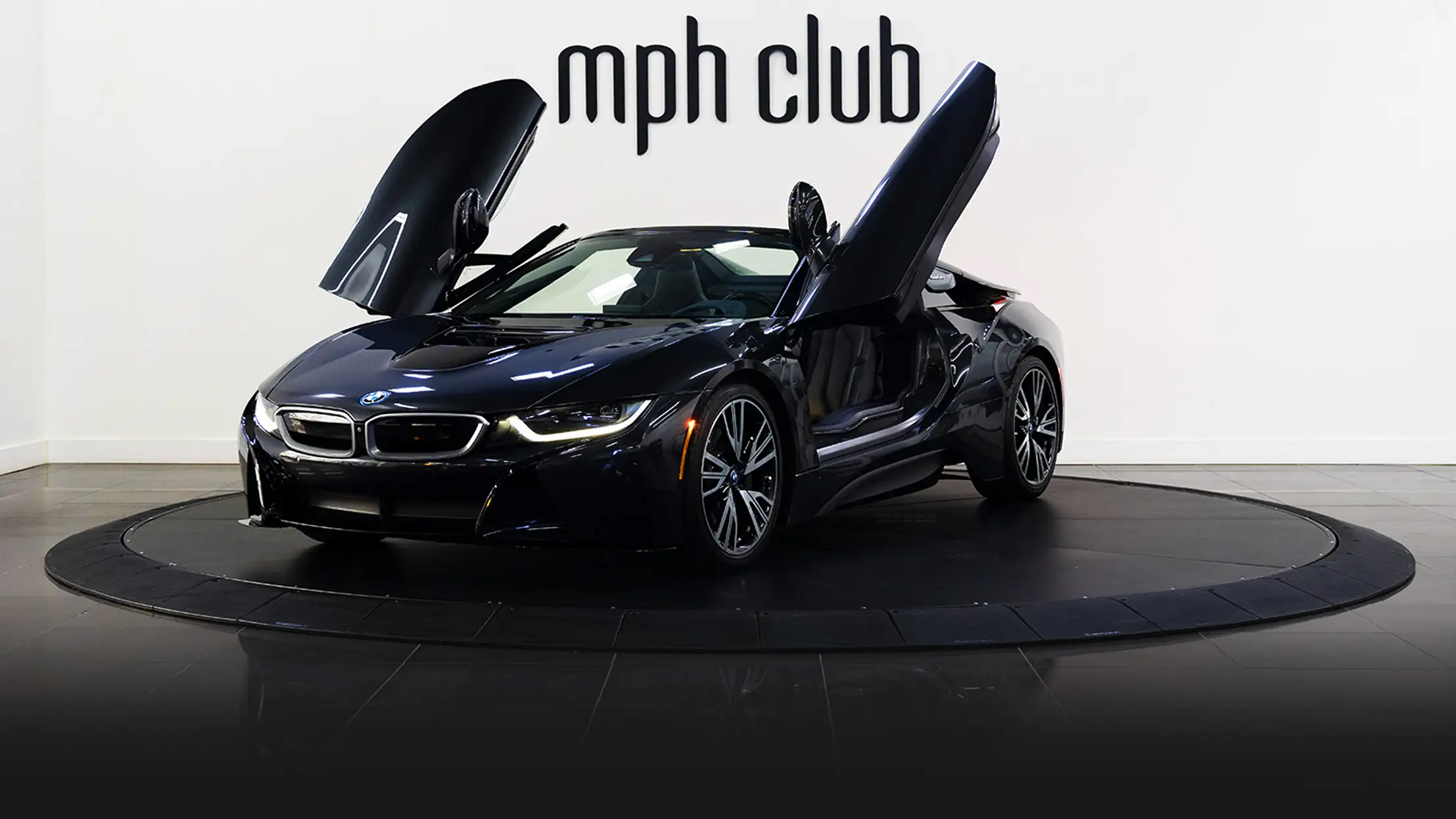Grey on black BMW I8 rental profile view rszd mph club