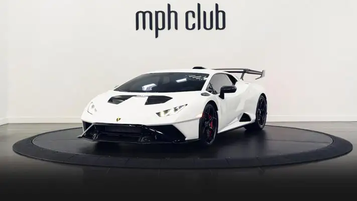Lamborghini Huracan STO rental Miami profile view rszd mph club