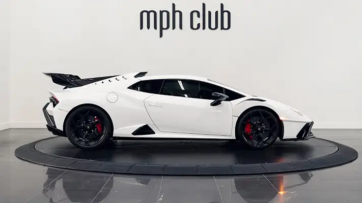 Lamborghini Huracan STO rental Miami side view mph club
