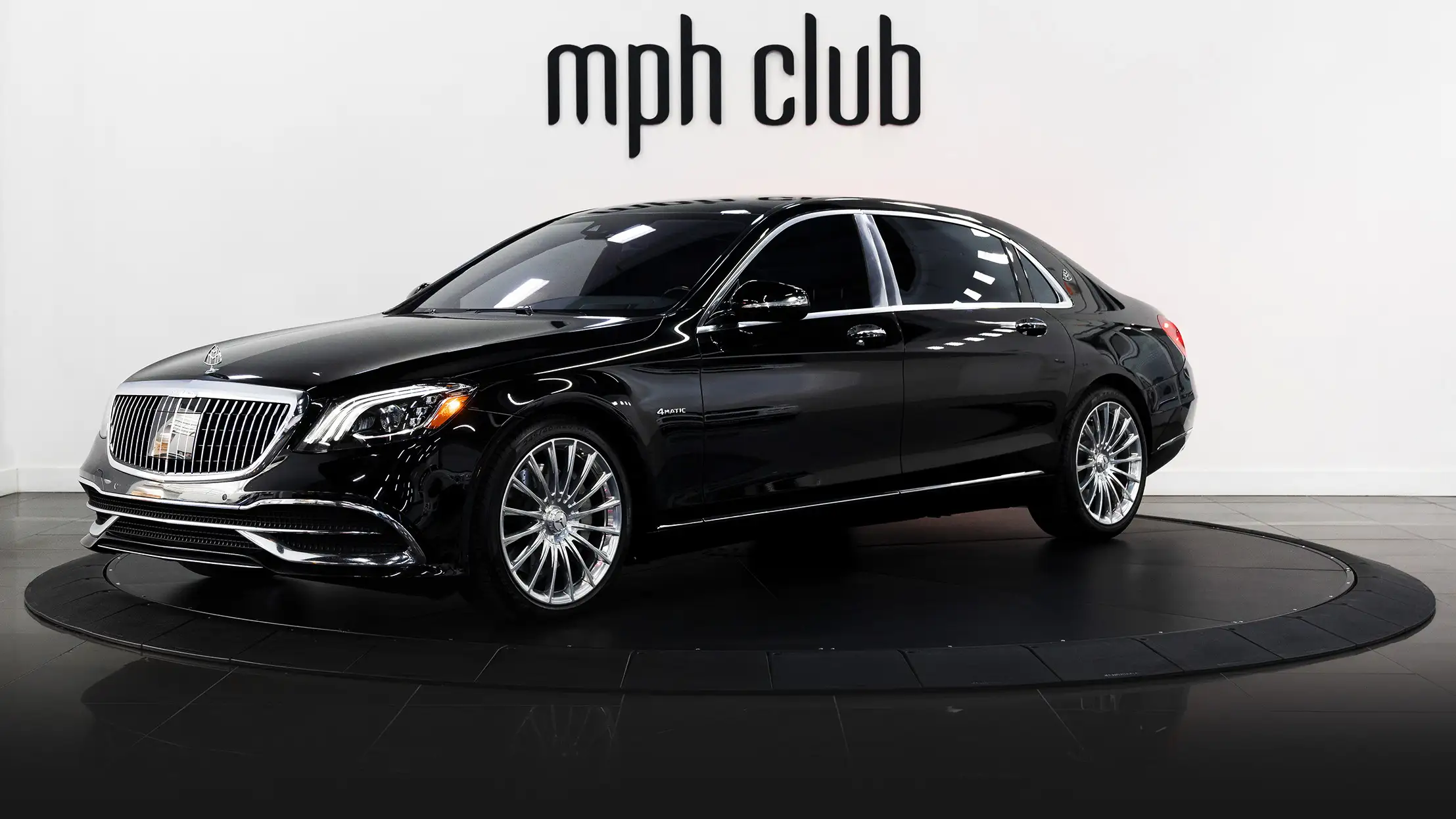 Black Mercedes Benz Maybach rental profile view mph club