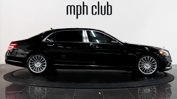 Black Mercedes Benz Maybach rental side view mph club
