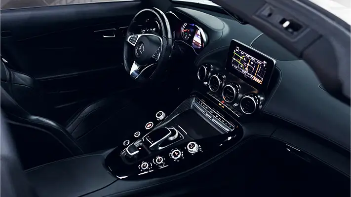 Gray Mercedes Benz GT Convertible rental dashboard view mph club