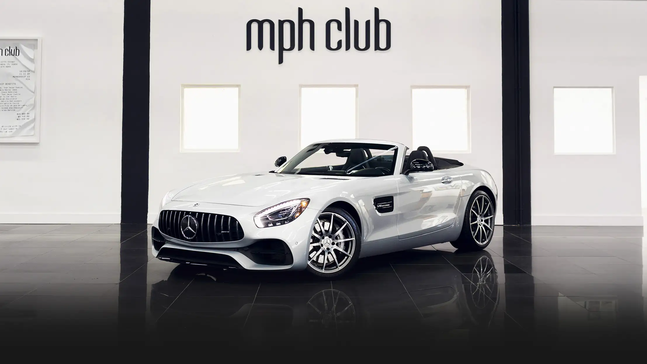 Gray Mercedes Benz GT Convertible rental profile view mph club