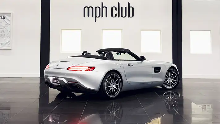 Gray Mercedes Benz GT Convertible rental rear view mph club