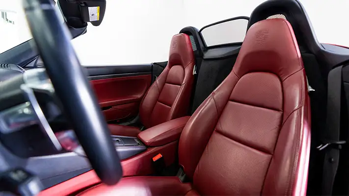 Porsche 718 Boxster rental interior view mph club