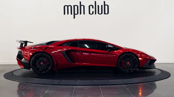 Red Lamborghini Aventador SV rental Miami side view mph club