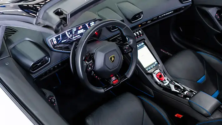 White Lamborghini Huracan Evo rental dashboard view mph club