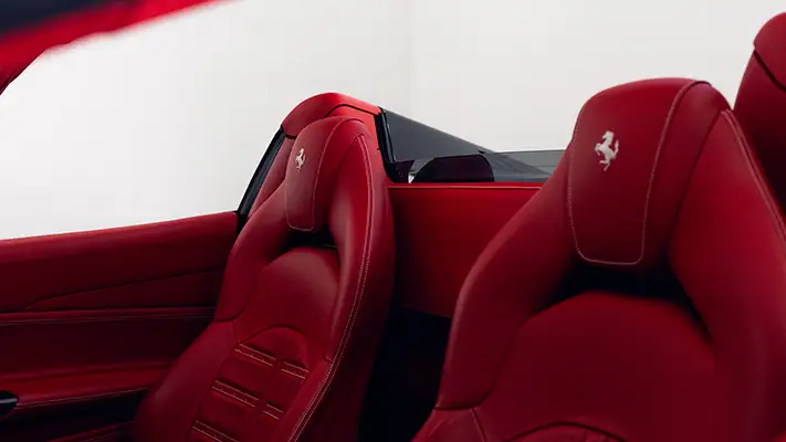 White on red Ferrari 488 Spider for rent interior view mph club