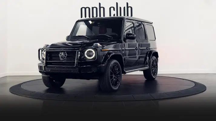 Black on red Mercedes Benz G550 rental profile view turntable rszd mph club