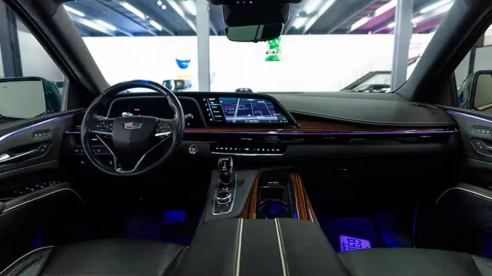 Cadillac Escalade ESV rental dashboard view turntable mph club