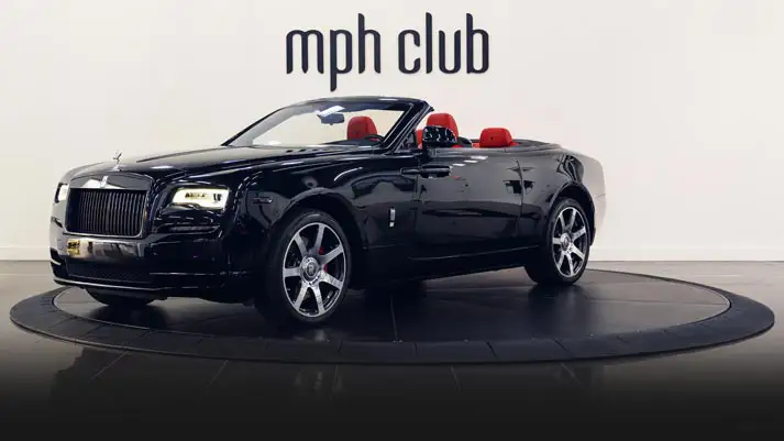 Black Rolls Royce Dawn rental profile view turntable rszd mph club