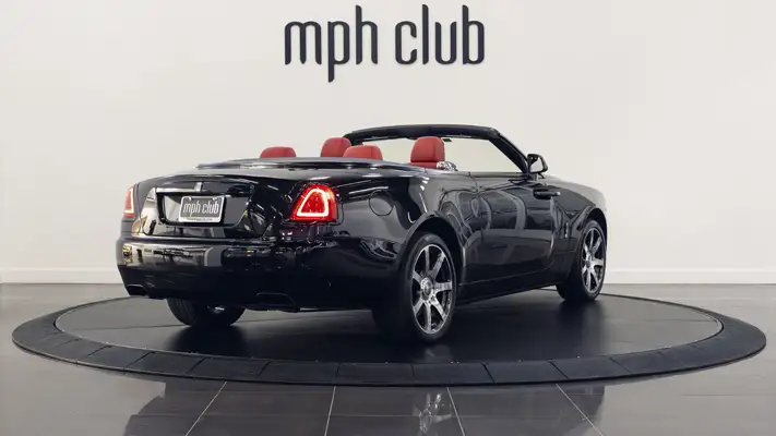 Black Rolls Royce Dawn rental rear view turntable mph club