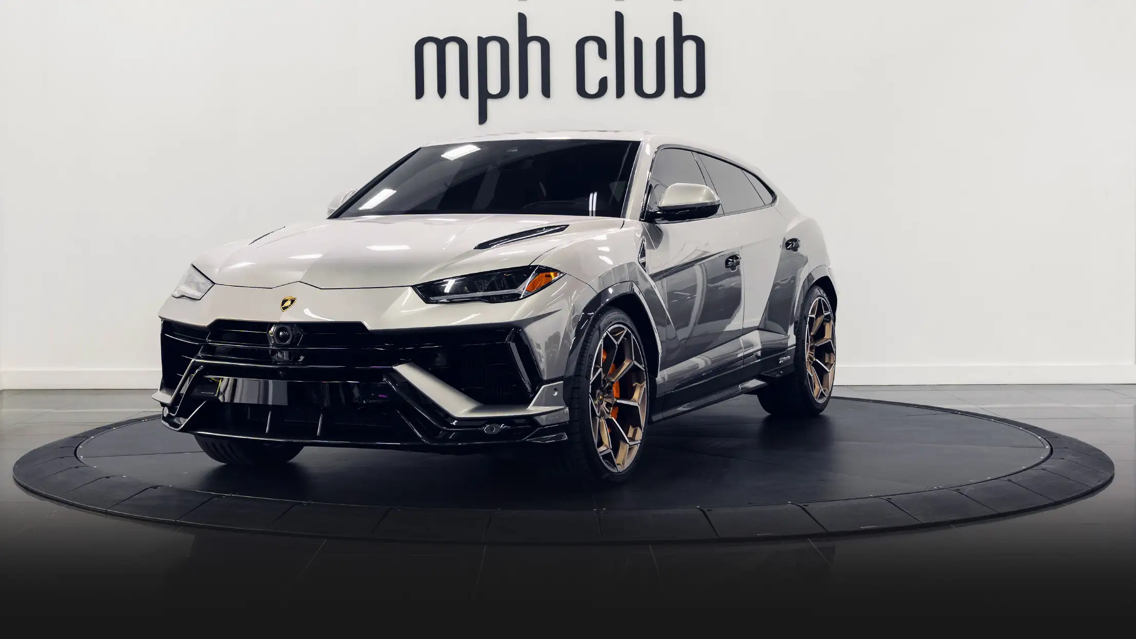 Grey Lamborghini Urus Performante rental profile view mph club