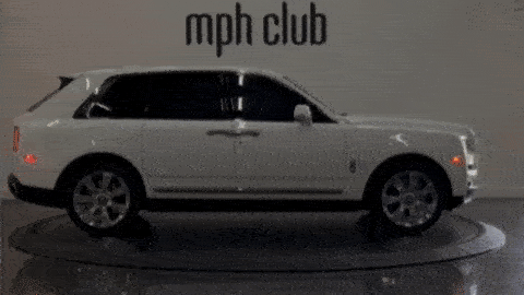 White exterior with orange interior Rolls Royce Cullinan rental mph club