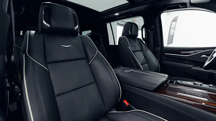 White on black Cadillac Escalade rental interior view turntable mph club