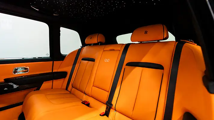 Black on orange Rolls Royce Cullinan black badge rental interior view mph club