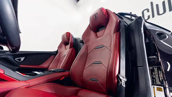 Black on red Lamborghini Huracan Evo Spyder rental interior view mph club turntable
