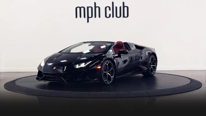 Black on red Lamborghini Huracan Evo Spyder rental profile view rszd mph club turntable