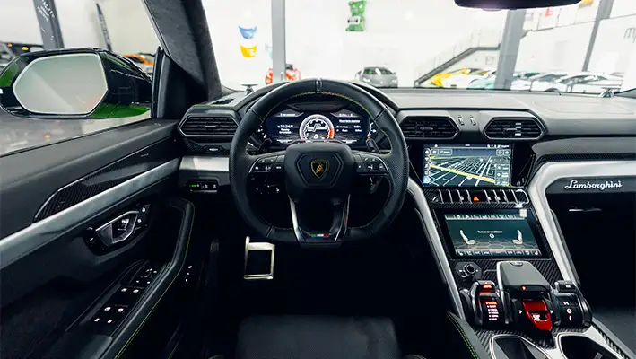 Green Lamborghini Urus rental dashboard view mph club