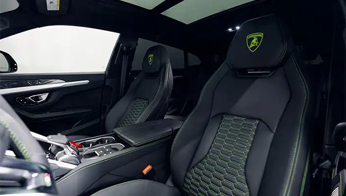 Green Lamborghini Urus rental interior view mph club