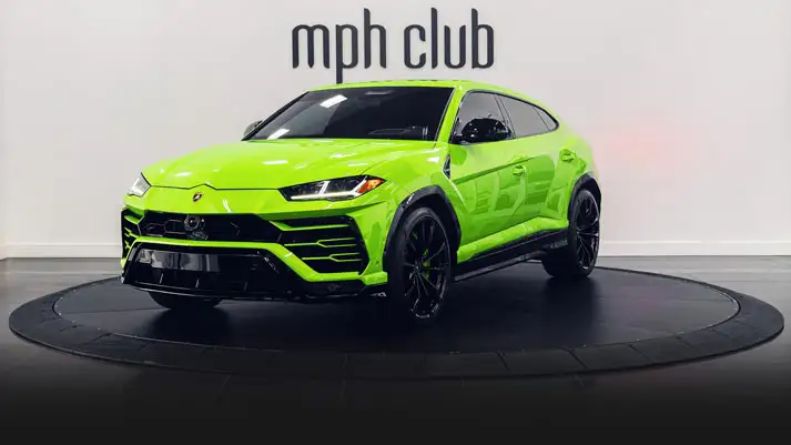 Green Lamborghini Urus rental profile view rszd mph club