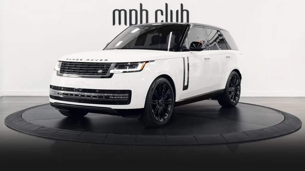 White Range Rover rental Miami profile view mph club