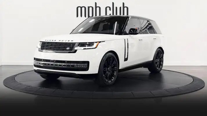 White Range Rover rental Miami profile view rszd mph club