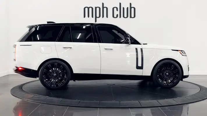 White Range Rover rental Miami side view mph club