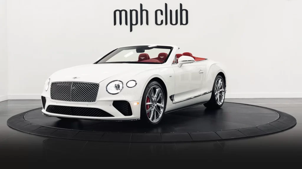 White with red Bentley Continental GTC rental profile view mph club